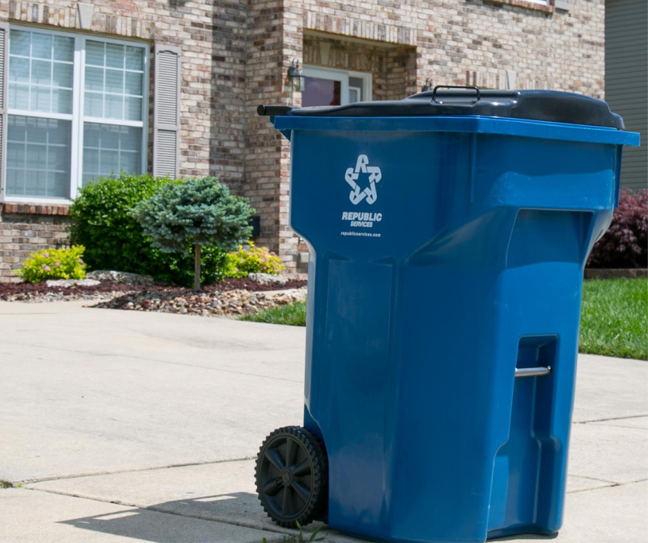 trash can sitting outside of house